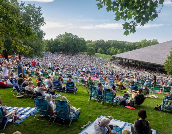 People sit on the Blossom lawn