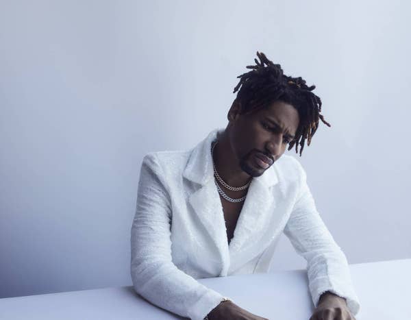 Jon Batiste in white blazer