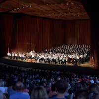 interior photo of Blossom Music Center pavilion with The Cleveland Orchestra on stage