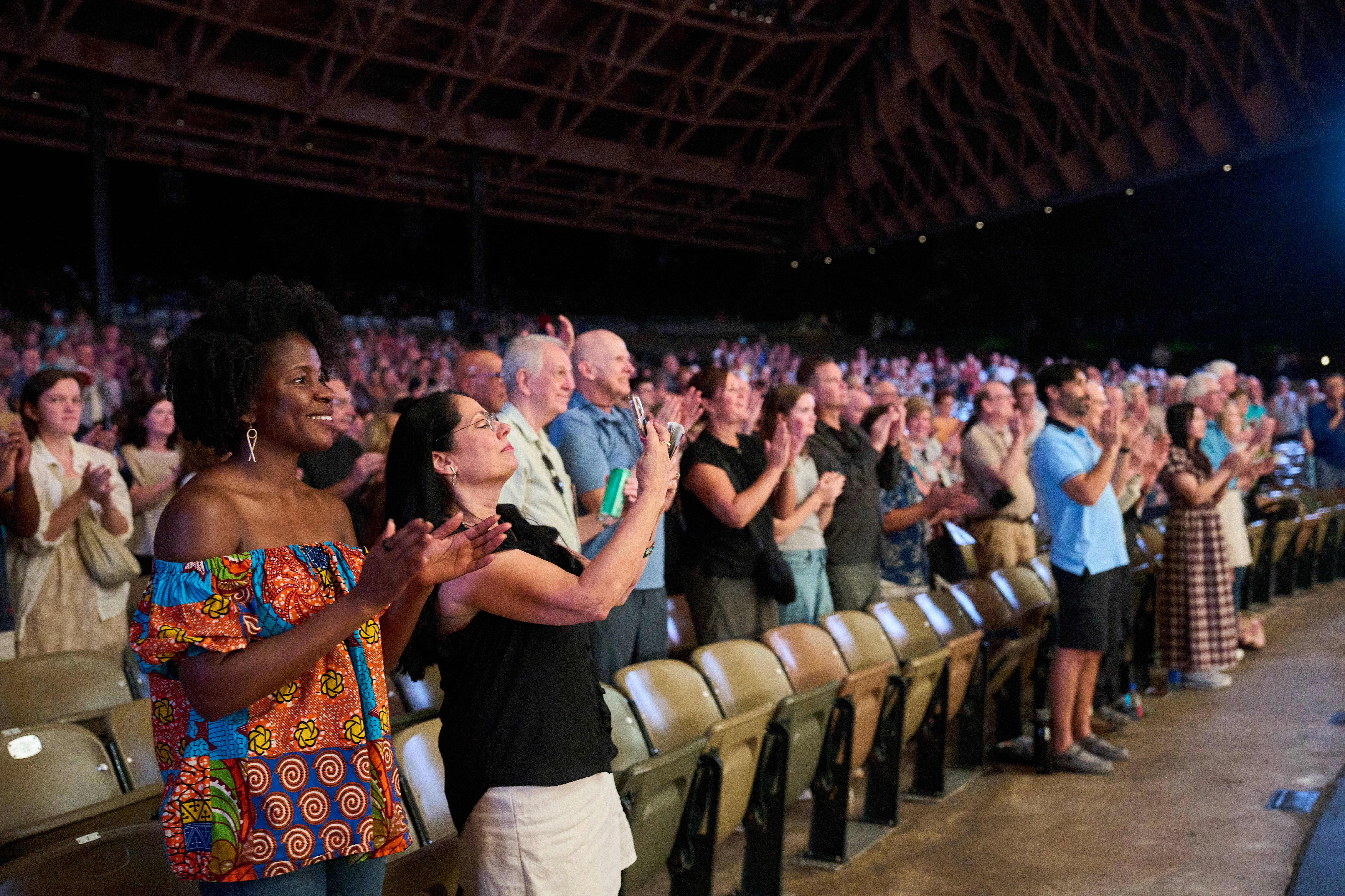patrons applauding in the Blossom pavilion