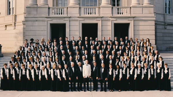 Morrell and the Cleveland Orchestra Chorus in 1991, posed in front of Severance