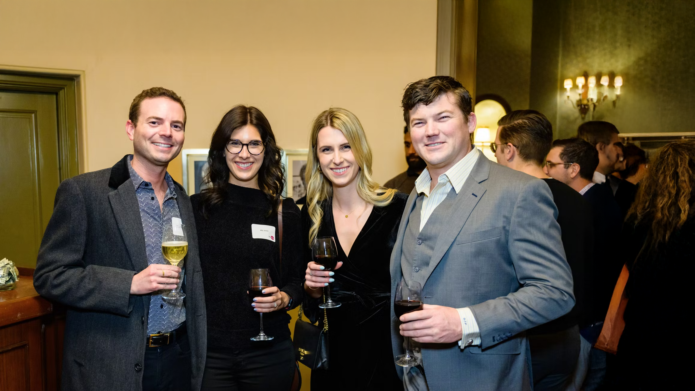 pre-concert reception photo of four patrons