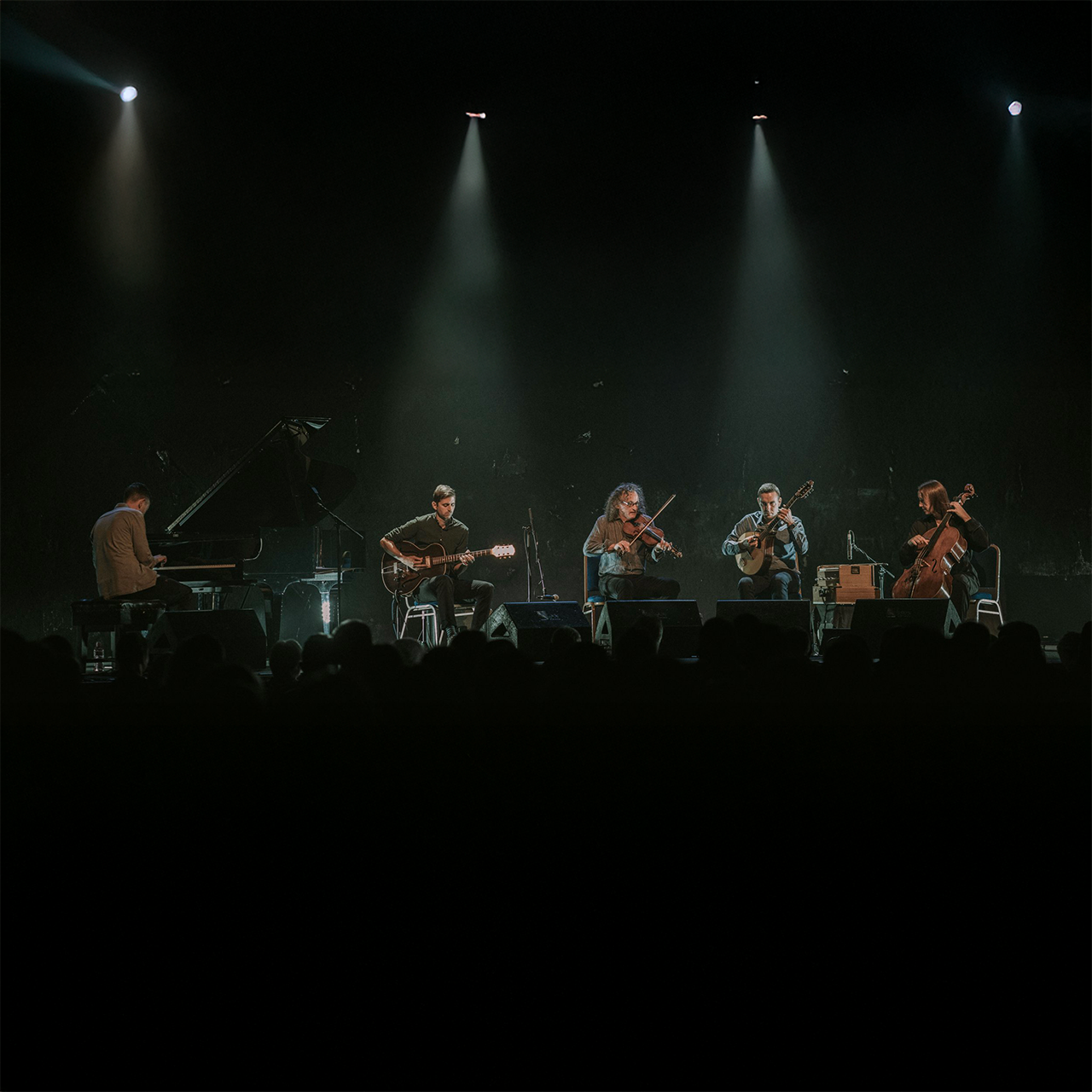The Common Ground Ensemble performing on stage
