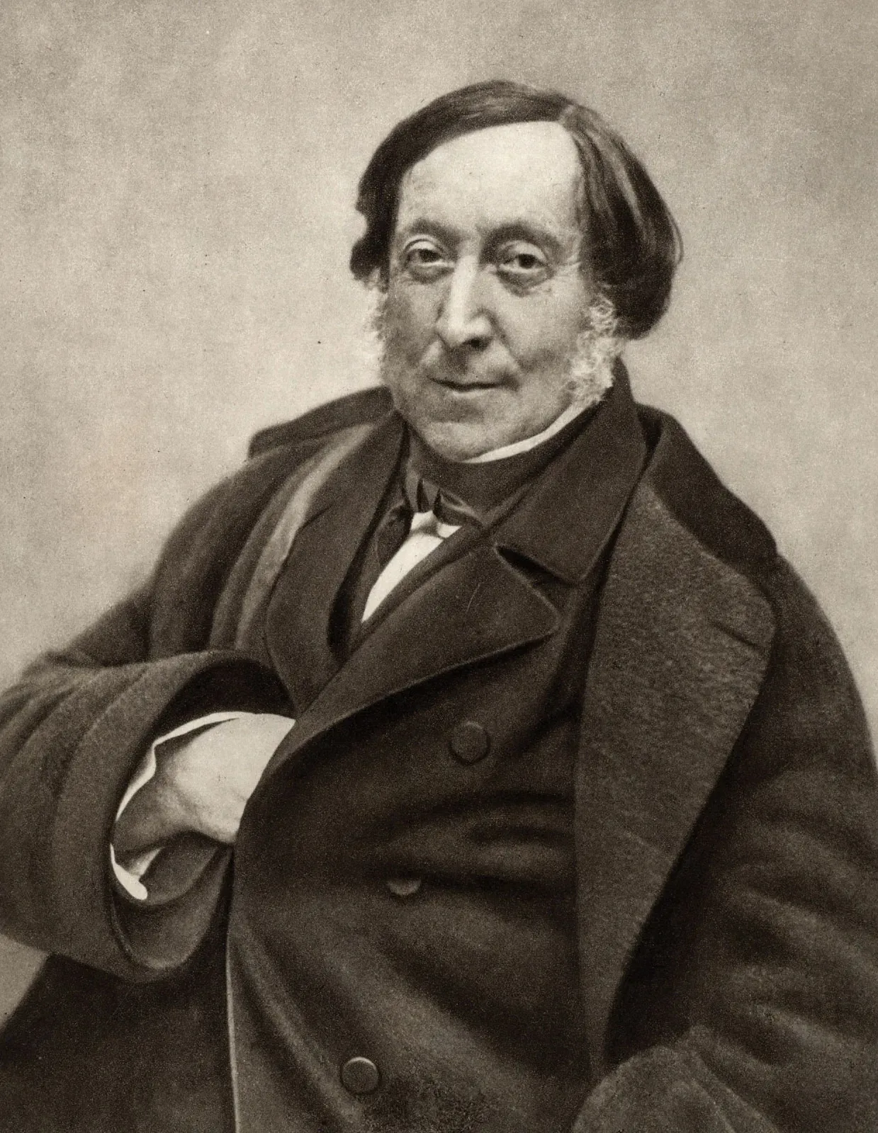Sepia portrait of Gioachino-Rossini, wearing a bow tie, and a dark coat.