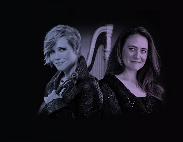 Leila Josefowicz and Trina Struble posed back to back on a black background