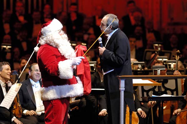 Santa Claus teases Porco during a 2006 holiday concert.