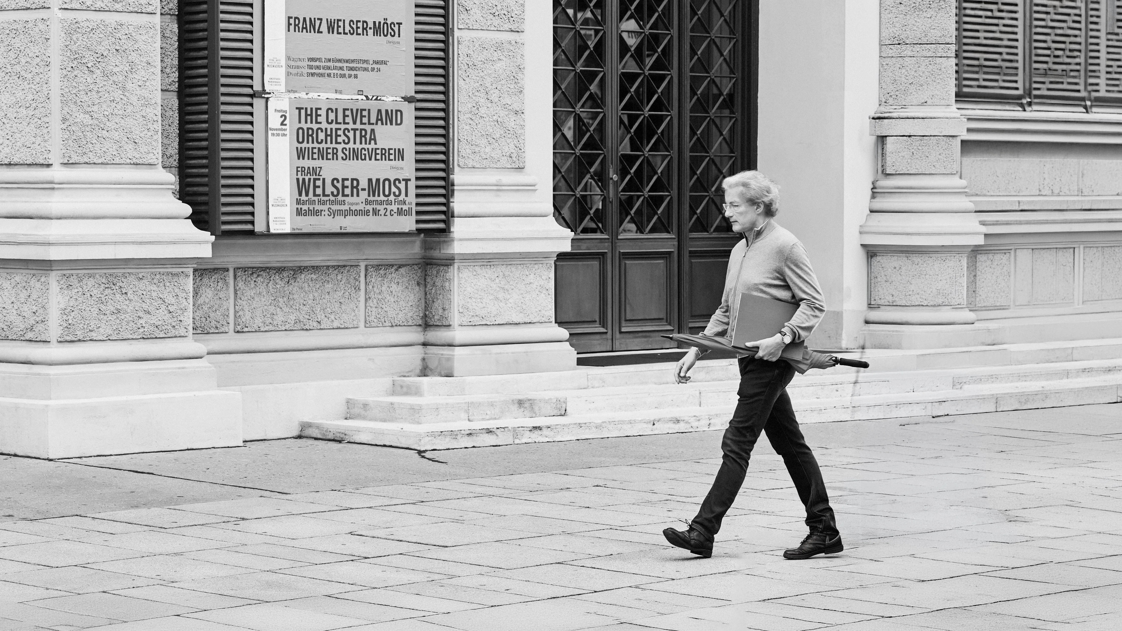 Franz Welser-Möst walking in front of the Musikverein in Vienna 