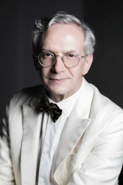 Fabio Luisi in a white jacket 