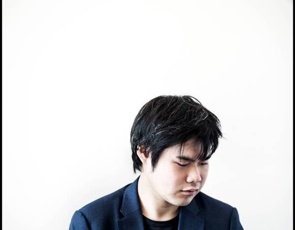 Nobuyuki Tsujji playing piano