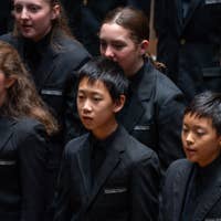 TCO Children's Chorus, image zoomed in on chorus members singing