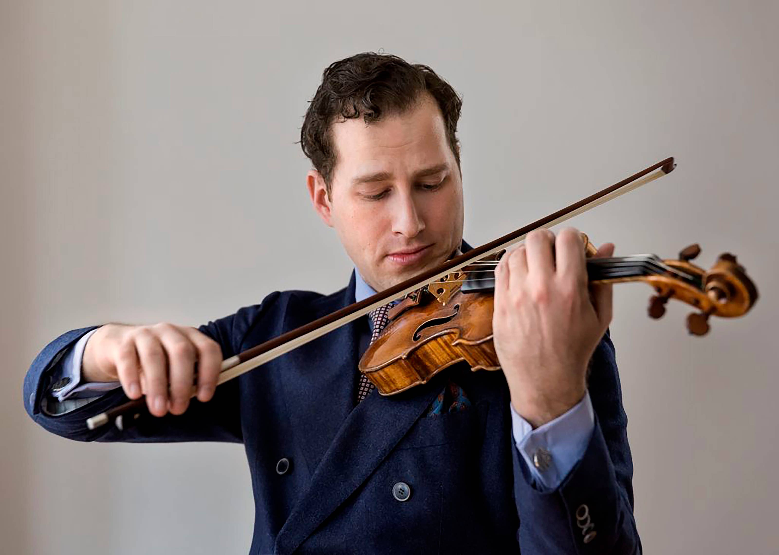 Nikolaj Szeps-Znaider playing a violin