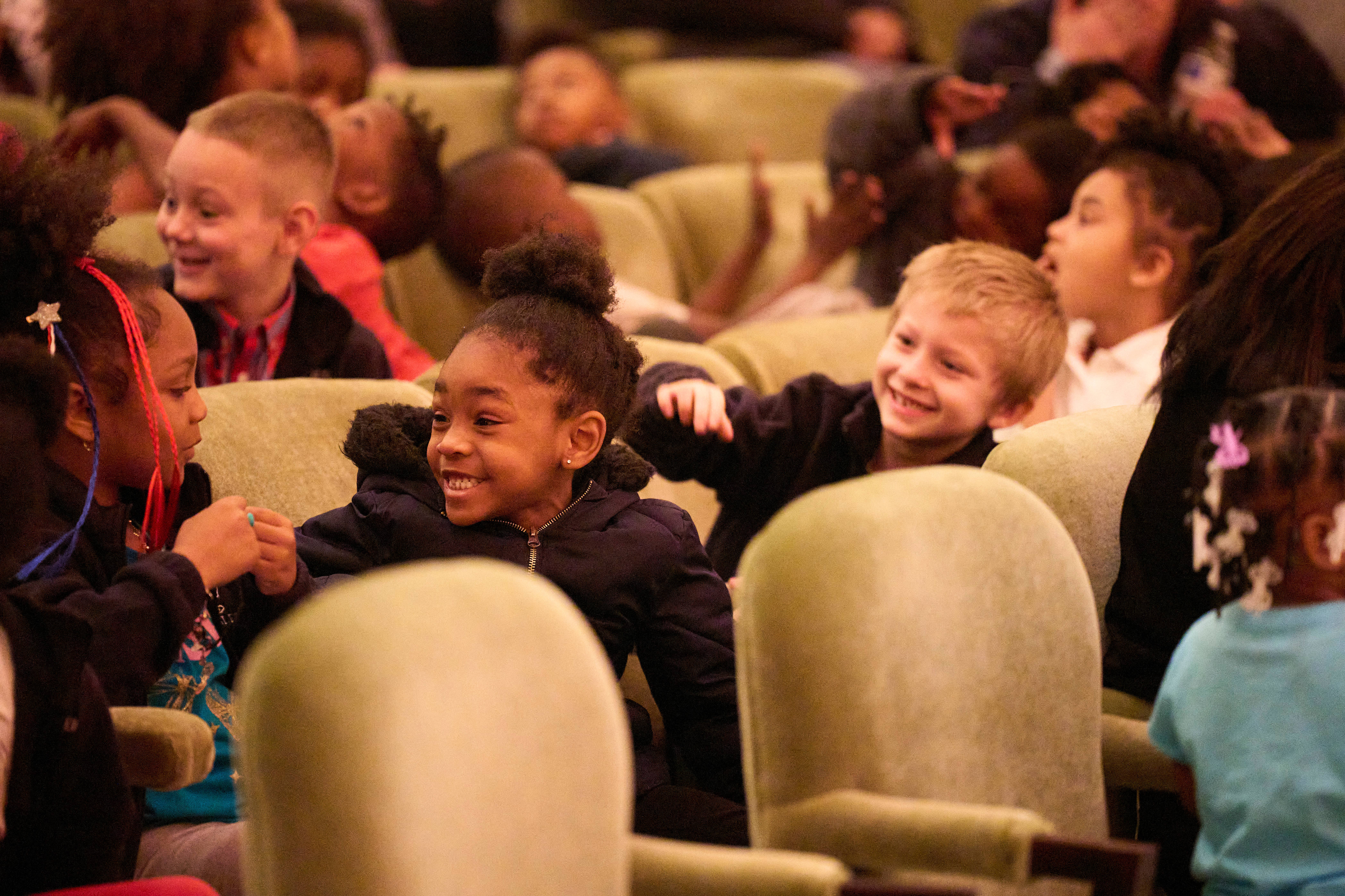 Young children in reinberger chamber hall