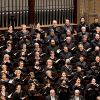 Chorus members singing