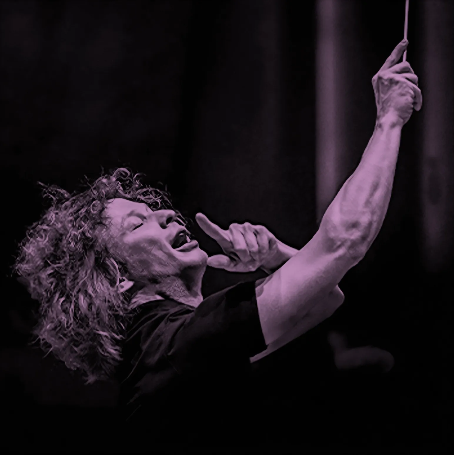 Conductor, Santtu-Matias Rouvali, passionately leading an orchestra, with expressive gestures and focused expression.