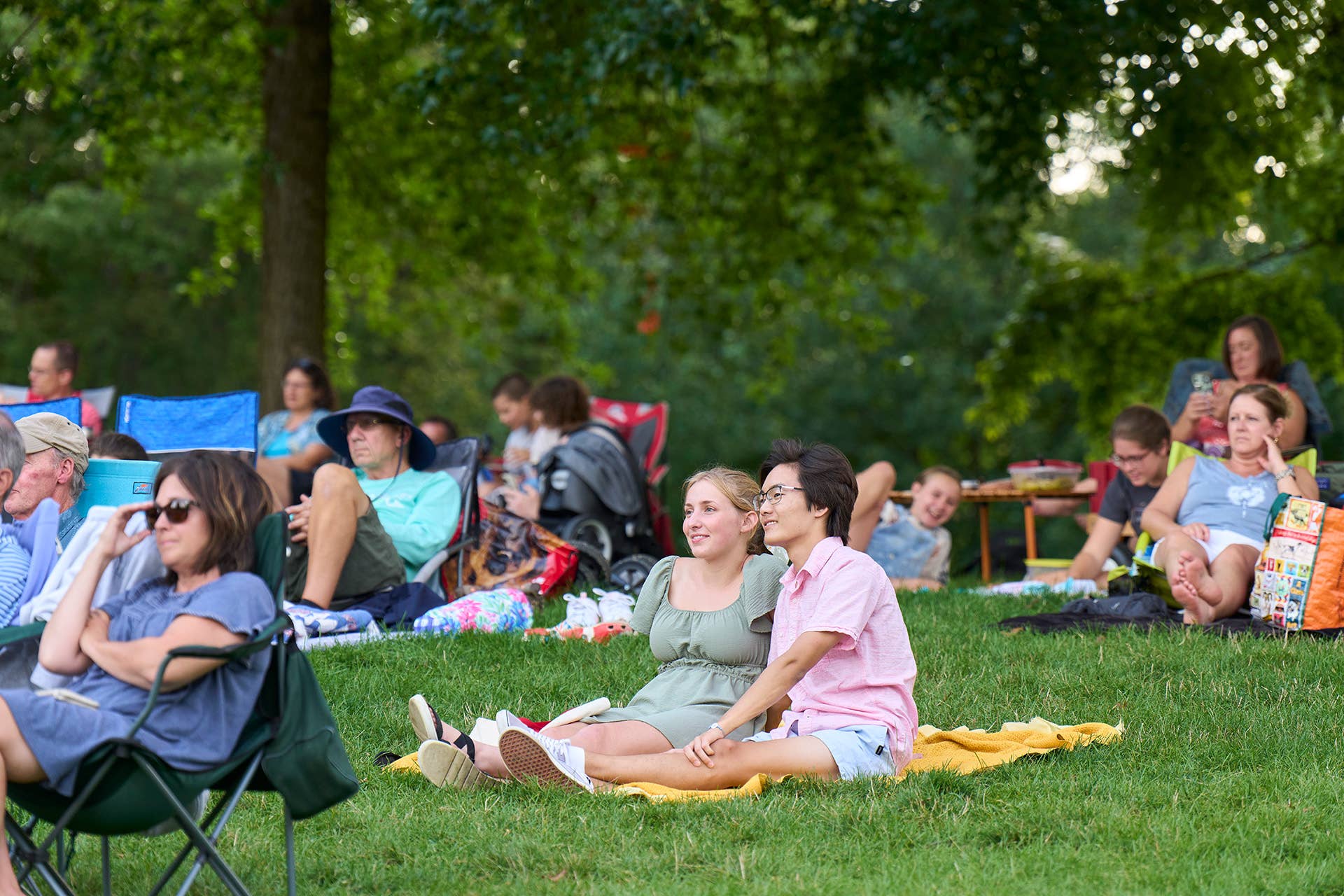 People sitting on the lawn at Blossom
