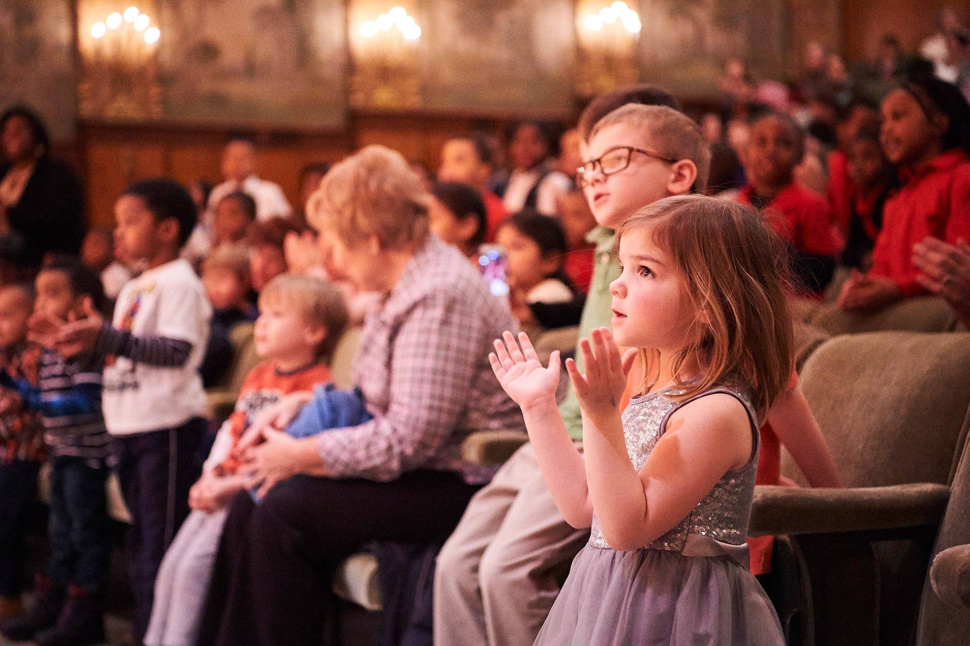 Children and families in Reinberger Chamber Hall
