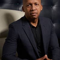 Bryan Stevenson in a dark suit