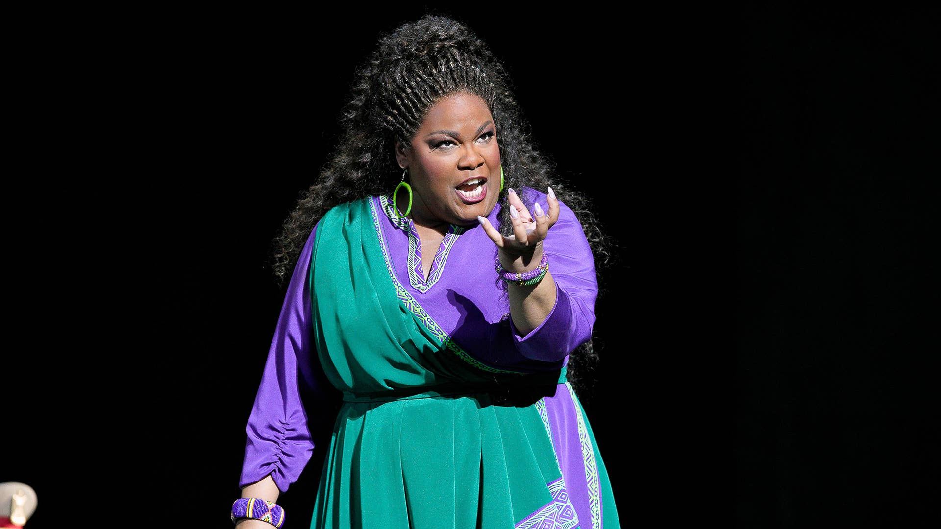 Latonia Moore performing on stage 