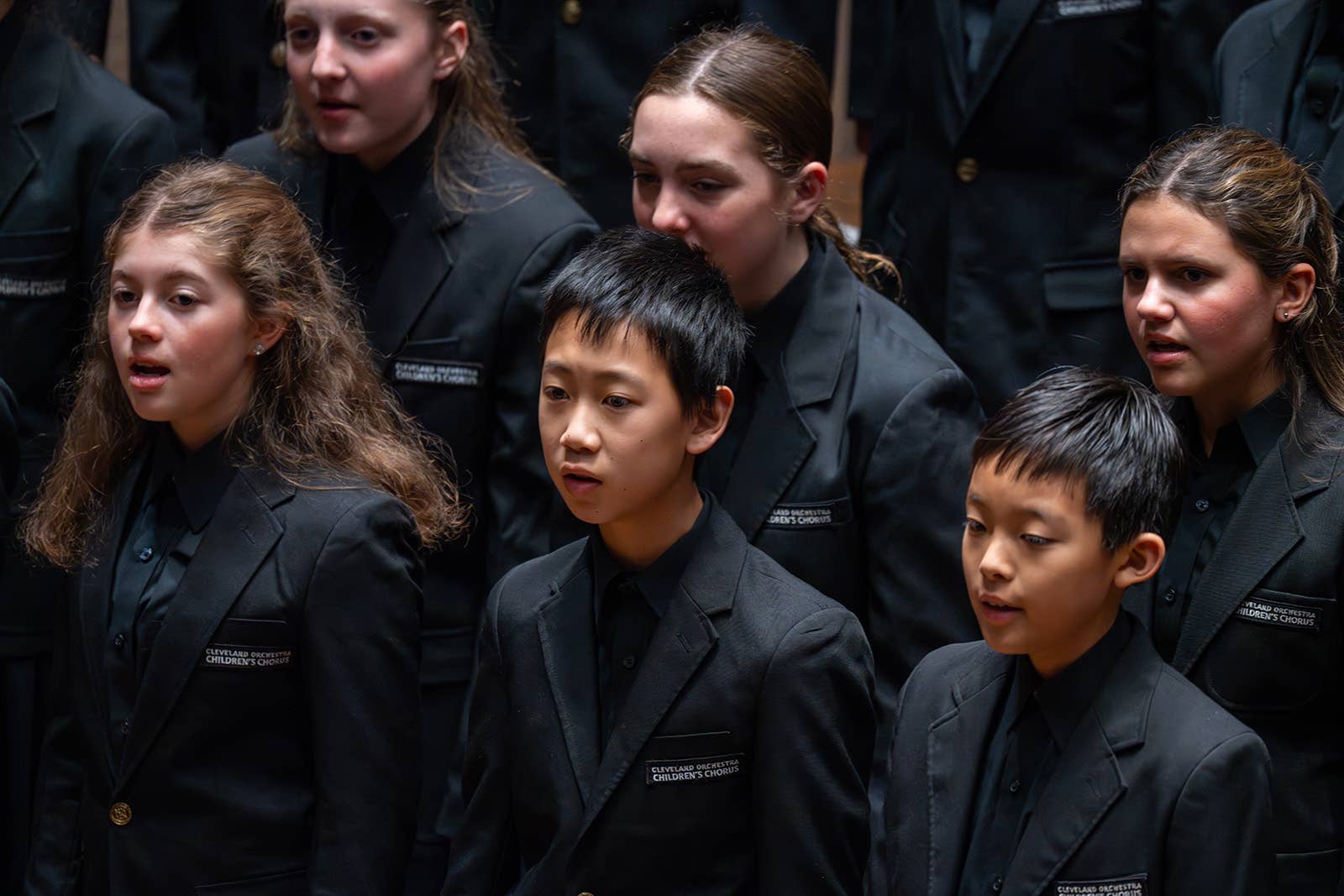 TCO Children's Chorus, image zoomed in on chorus members singing