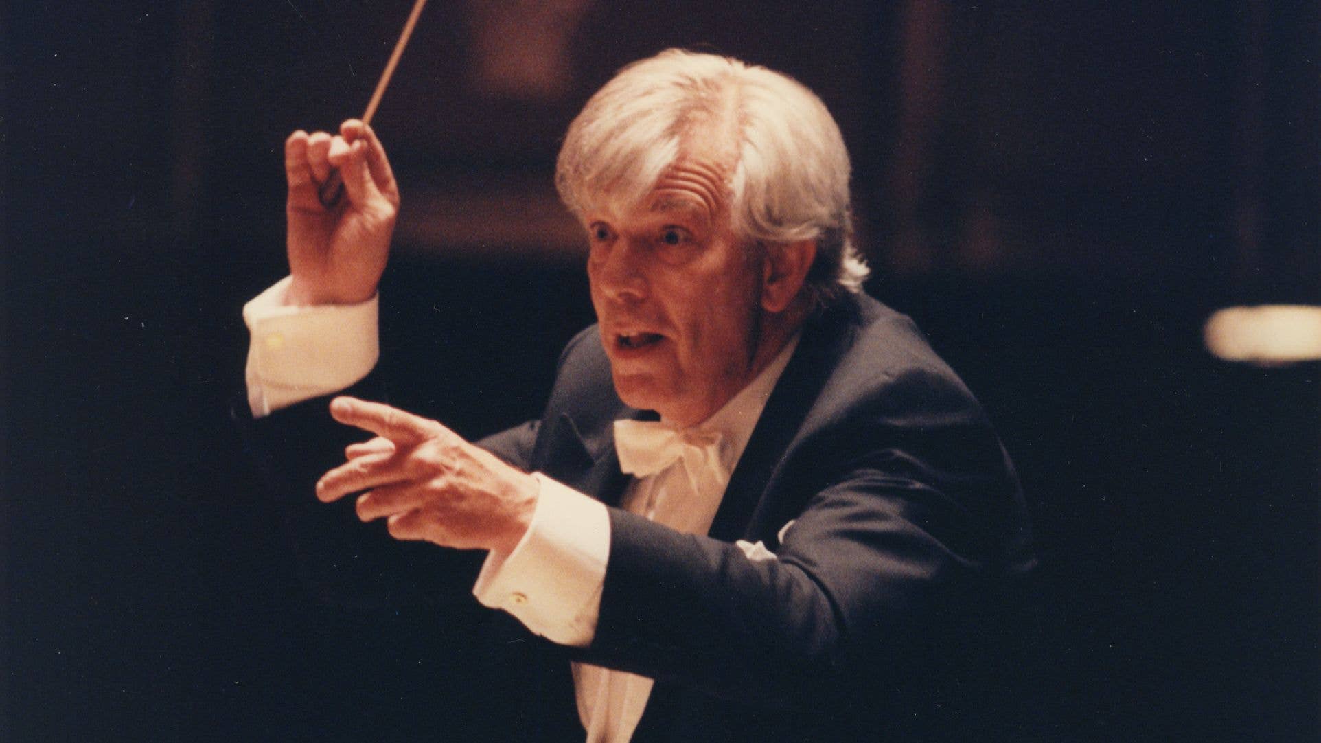 Christoph von Dohnányi is conducting. He is very animated, and almost smiling.