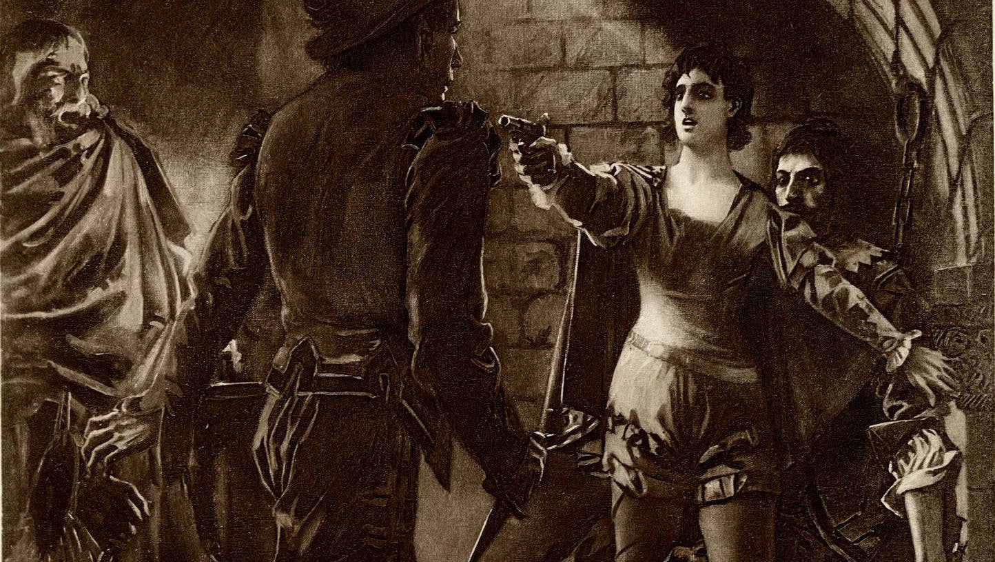 Don Pizarro, with his knife drawn, is approaching Florestan. Leonora, illuminated by light shining through the cell window, is shielding Florestan. She has drawn and aimed her pistol at Don Pizarro. Both Leonora and Florestan have their backs against the cell wall.