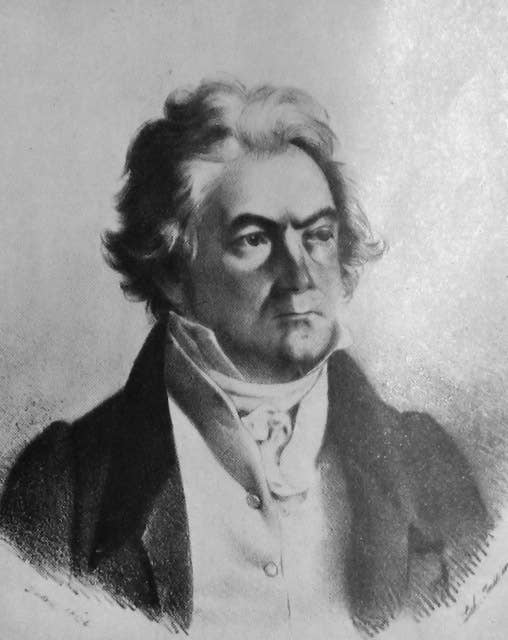 Beethoven is pictured as an elderly man. He has thick hair and a distant stare.