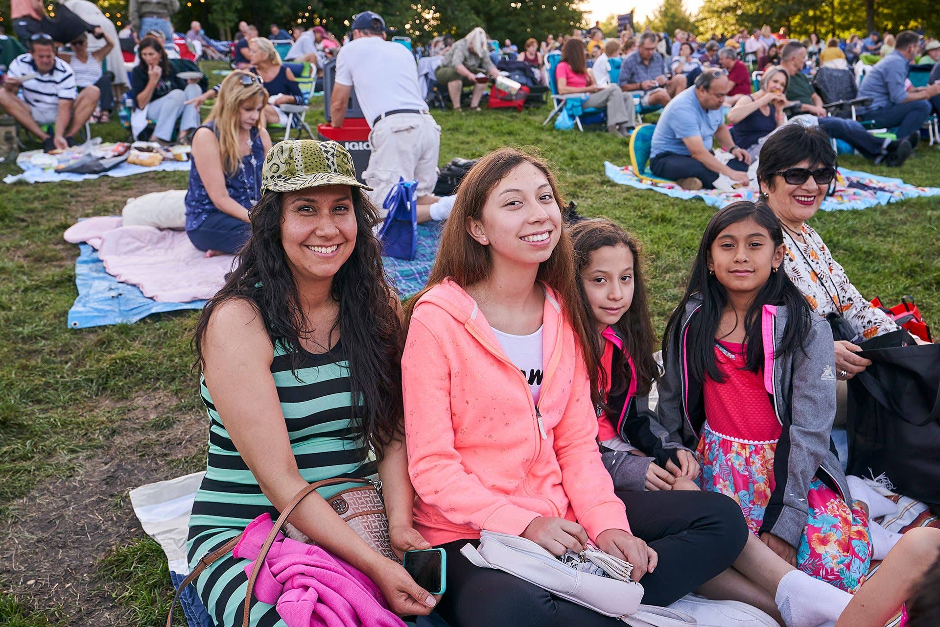 People sitting on the lawn at Blossom