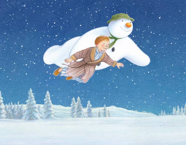 boy and snowman flying over snowy landscape