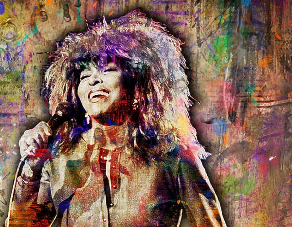 Colorful graffiti-style mural of Tina Turner with microphone, surrounded by abstract splashes on a brick wall.