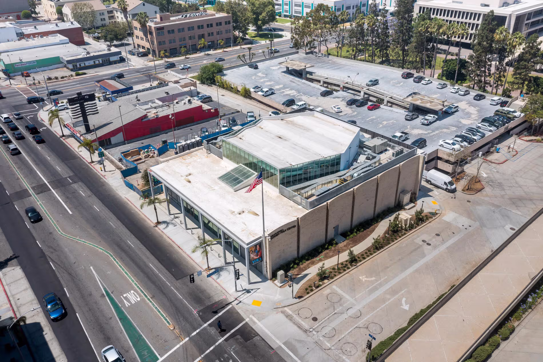 An aerial photo of the Beckmen YOLA center that shows the parking area behind the building.
