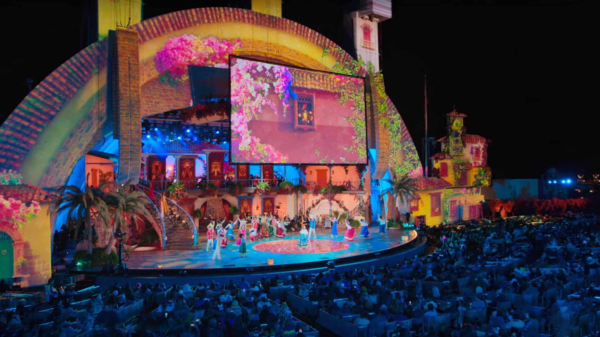 A festively lit Hollywood Bowl stage during the Encanto Live performance.
