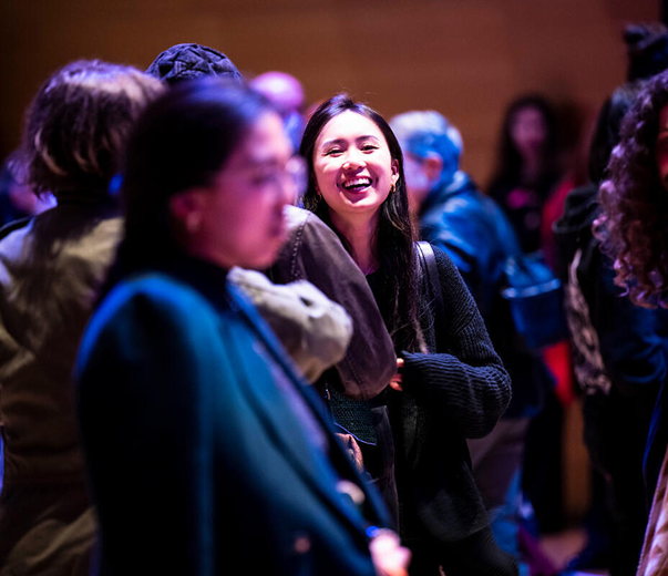 An audience member laughs during Ford's Comedy Under the Stars performance in 2023.