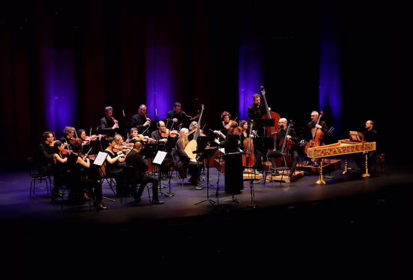 visiting ensemble performing on stage