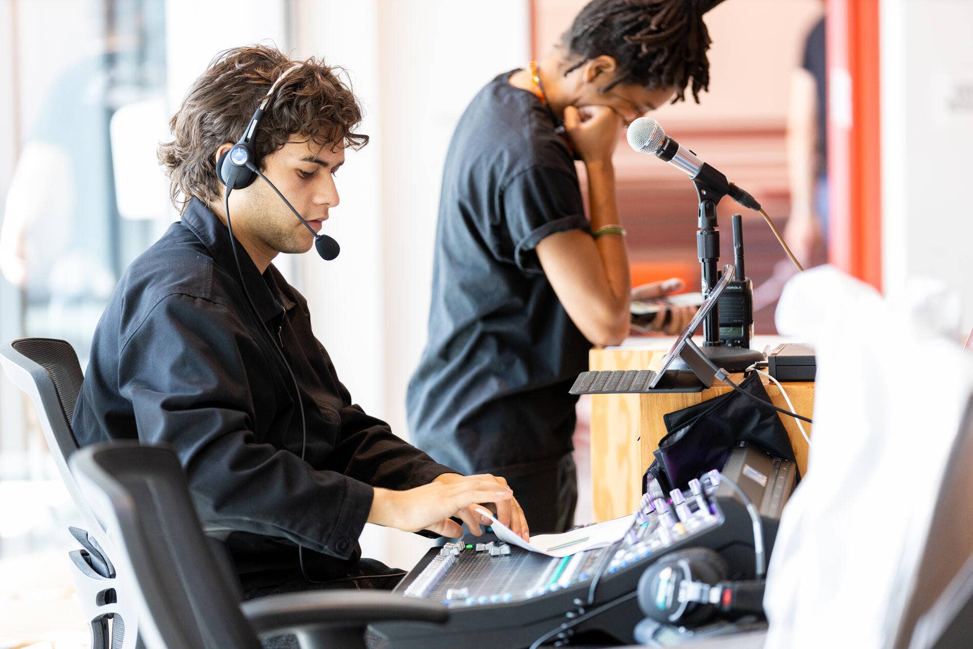 A Workforce Development Program participant prepares for a concert. 