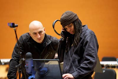 An instructor and student test equipment during an IATSE Workforce Development class.