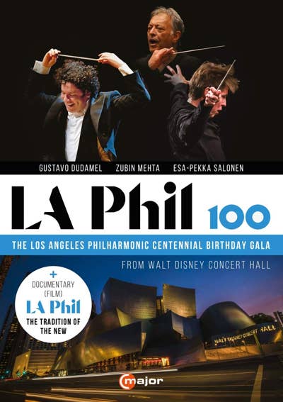 Conductor and musicians hold baton at left and right, with LA Phil Centennial birthday gala poster for Walt Disney Concert Hall.
