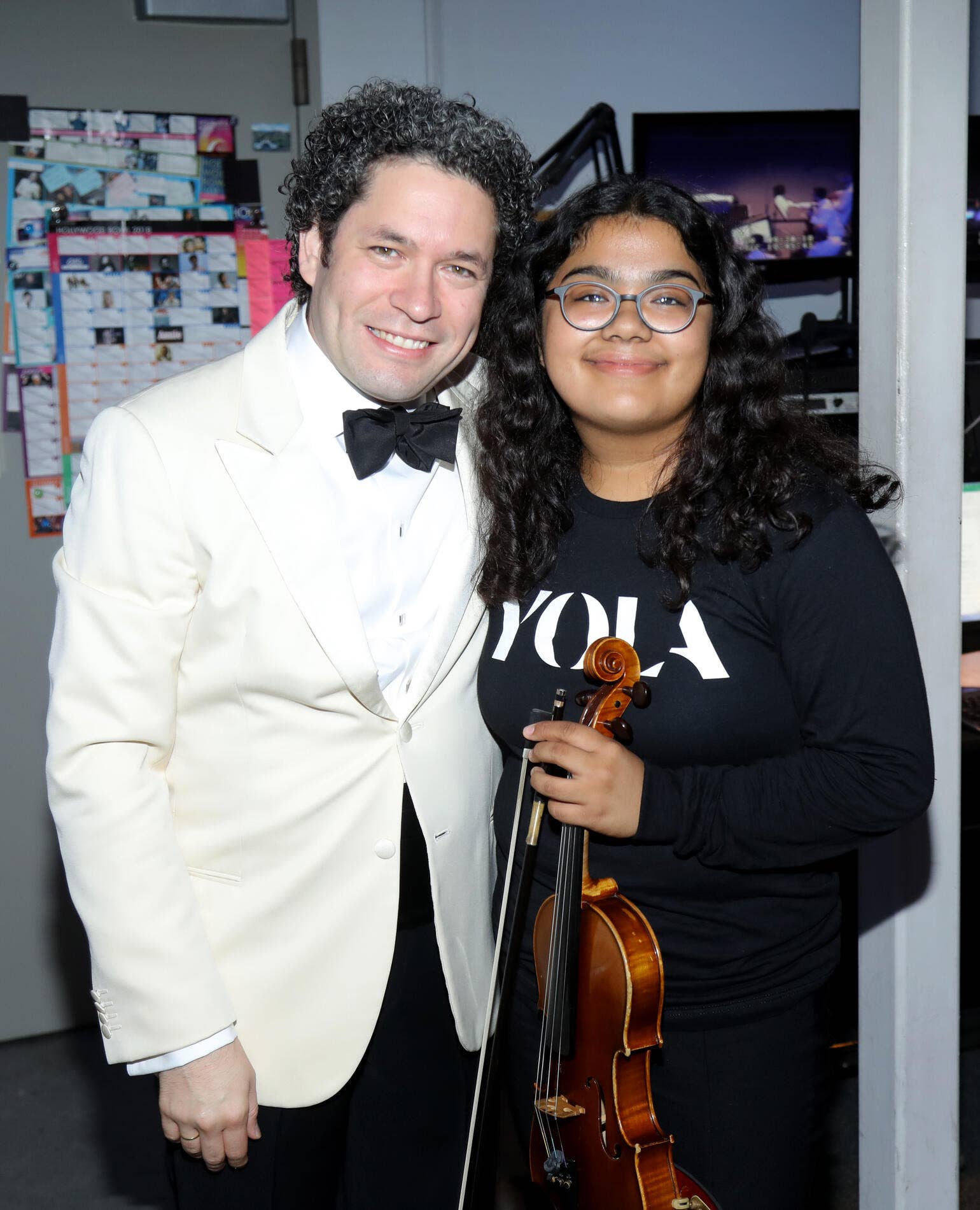 Liliana Morales poses with Gustavo Dudamel backstage at the Hollywood Bowl 100 event.