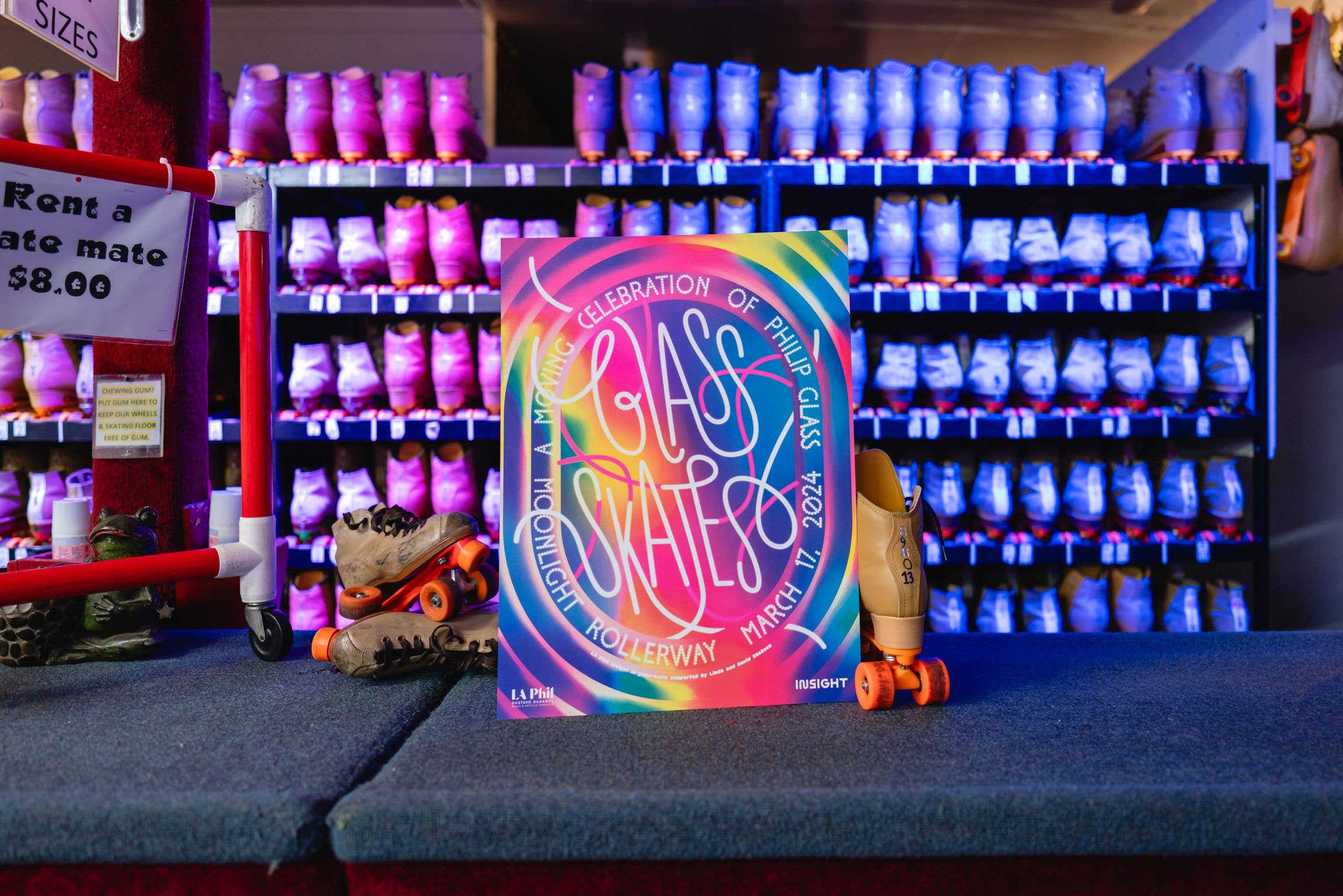 Rollerway admission poster with roller skates and shoes, in a lit rink with rows of LED skates.