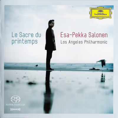 Man in dark suit standing on still waters with album text Le Sacre du printemps and Es-Pekka Salonen