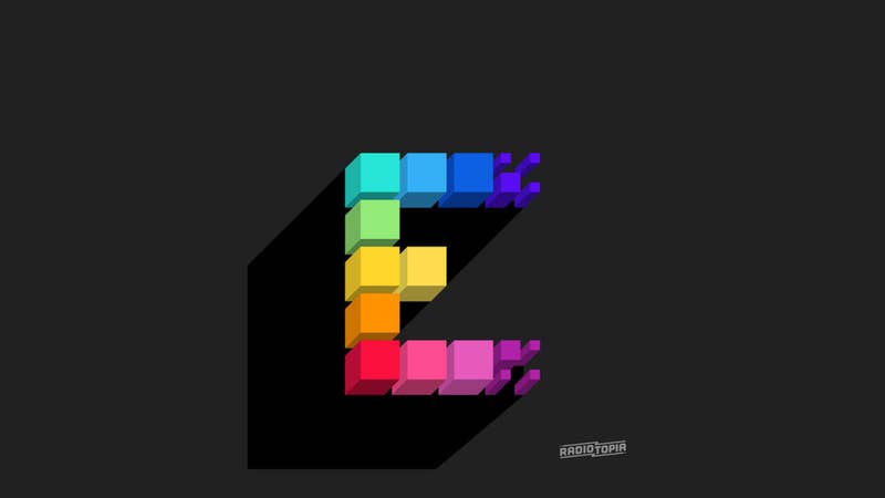 Multicolored blocky letter Z logo on black background with subtle shadow and small “RADIO TOPIR” text.