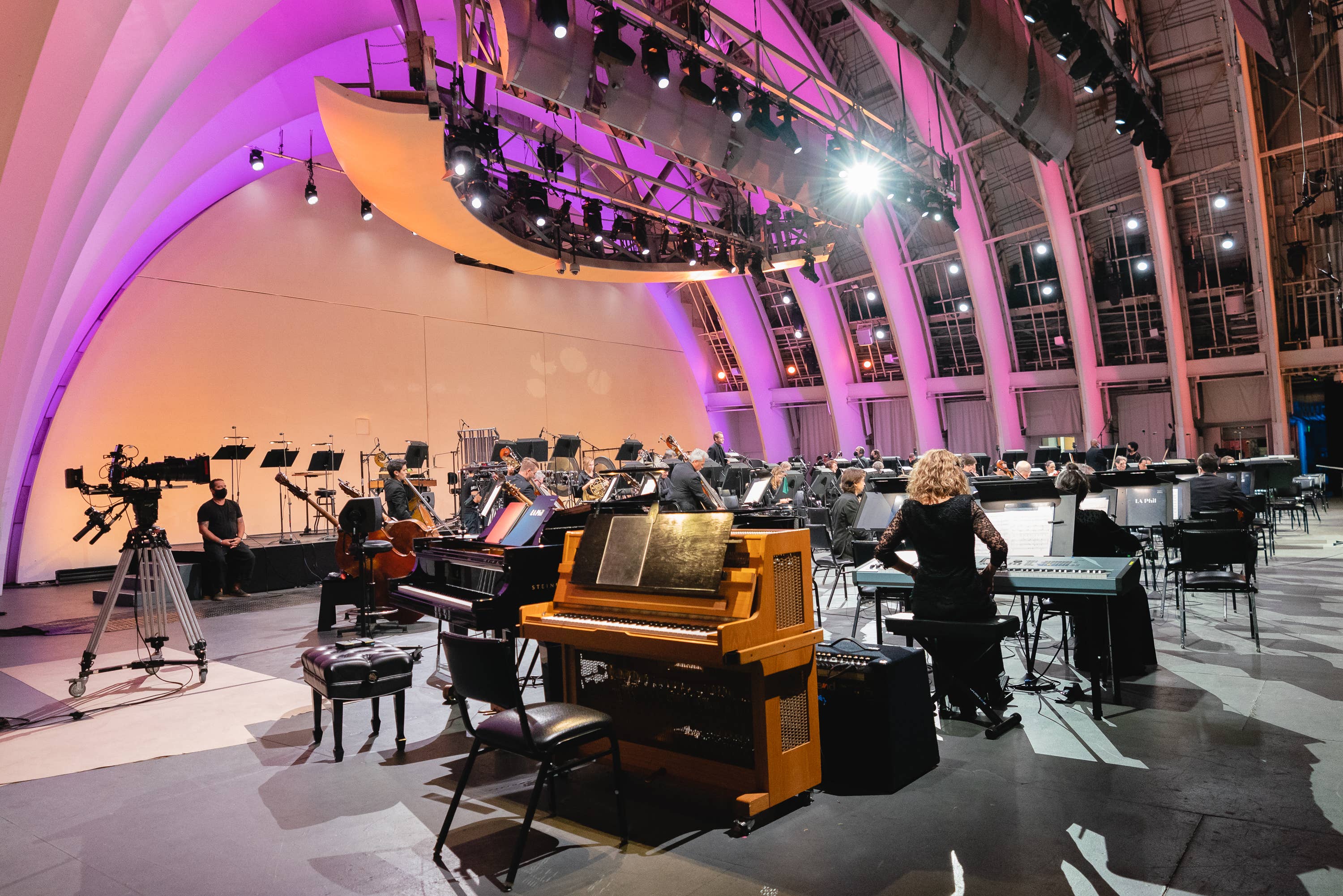 Musicians on the Hollywood Bowl stage during a recording session.