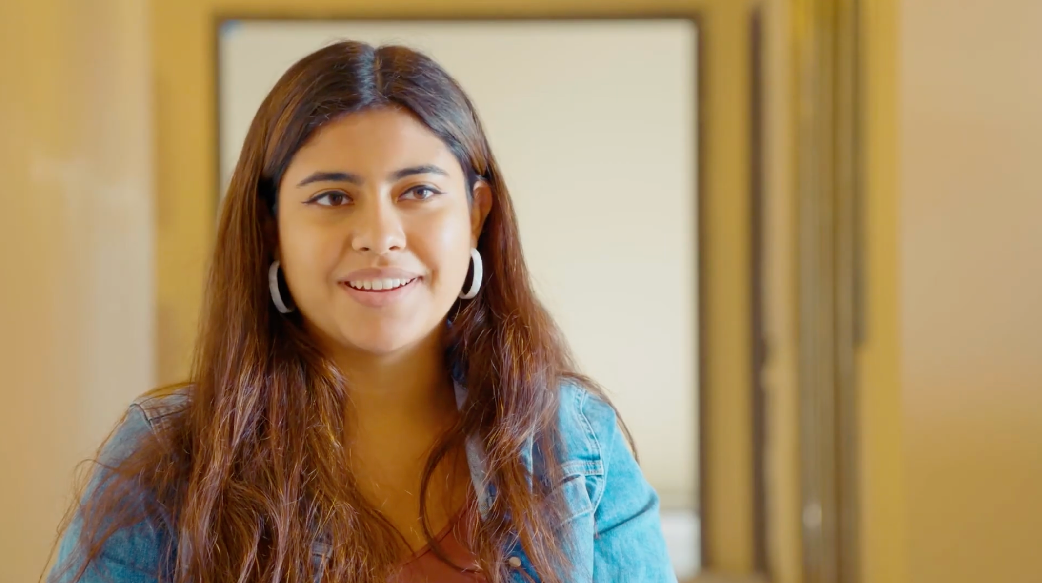 A video still from an interview with Laura Garcia, a YOLA alumni.