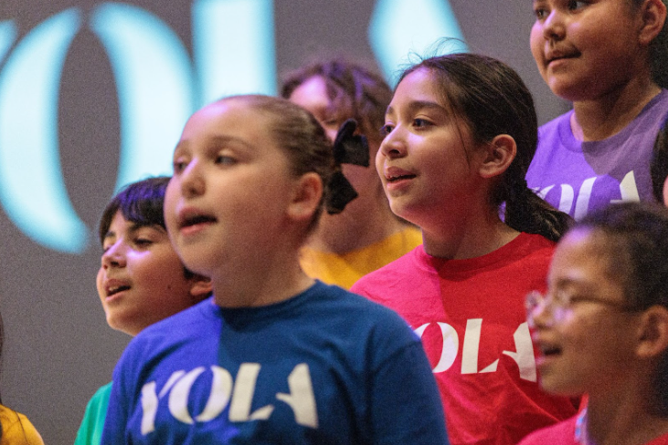 YOLA students sing during a performance.
