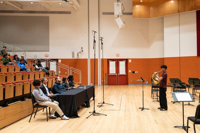 A YOLA student performs a solo during Horn Day at the Beckmen YOLA Center.