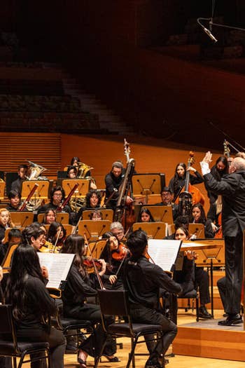 YOLA students perform Mahlerthon on stage at the Walt Disney Concert Hall.