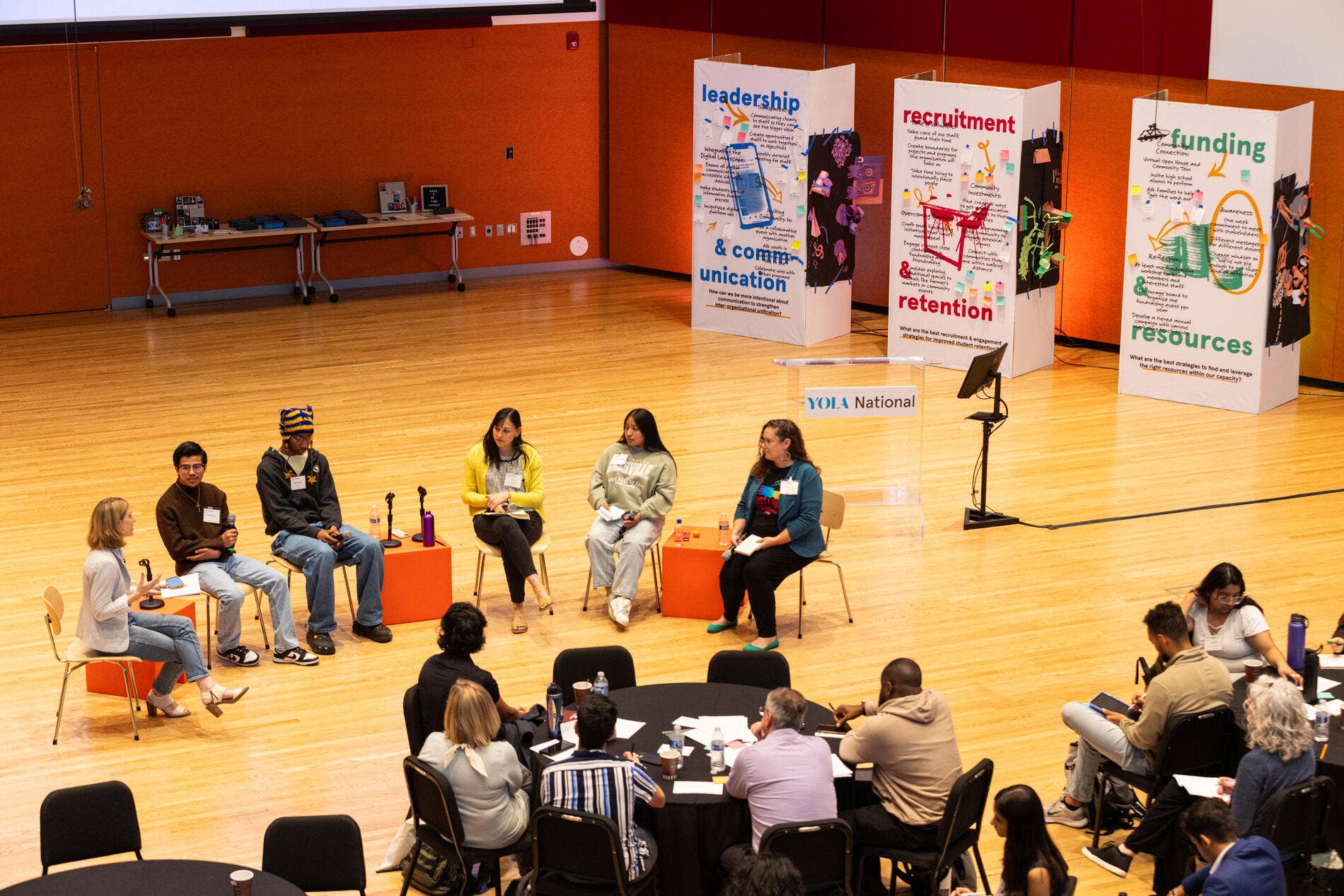 Attendees listen to a panel discussion during the YOLA National Accelerator workshop.