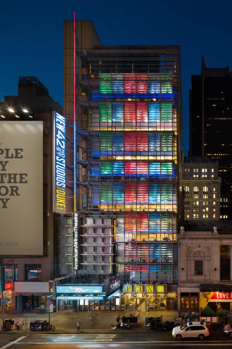 New 42 Studios and the American Airlines theater facade with bright LED lights on 42nd street
