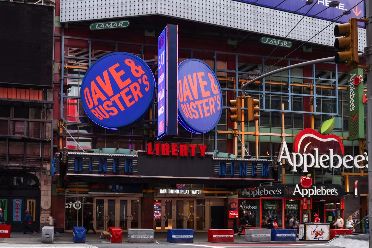 The Liberty Diner marquee showing Dave & Buster's and Applebee’s storefront.