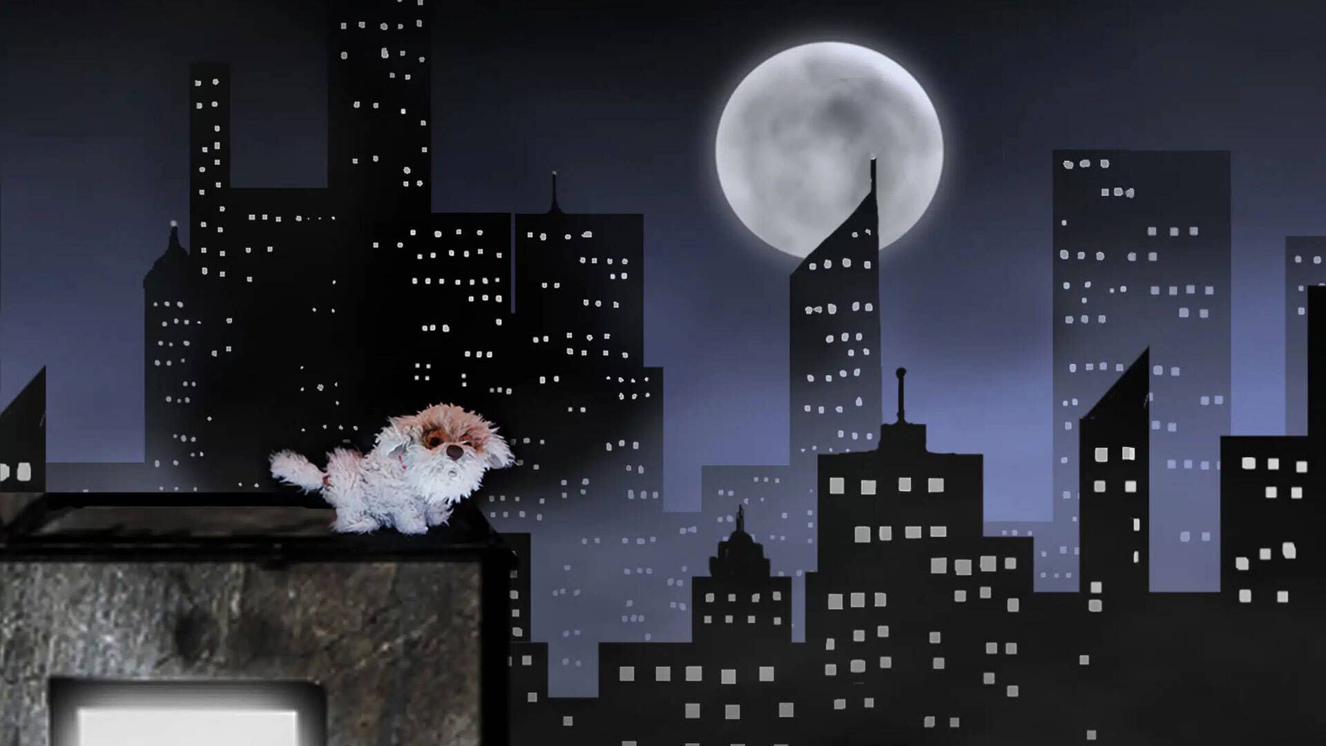 A fluffy white dog puppet stands on the roof of a building against a silhouetted cityscape and full moon.